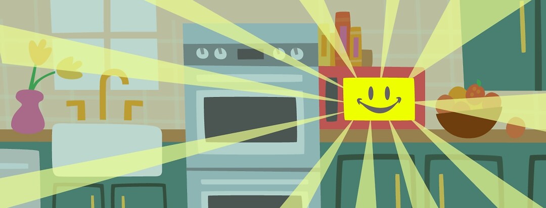 a microwave is glowing yellow with a classic cartoon smiley-face