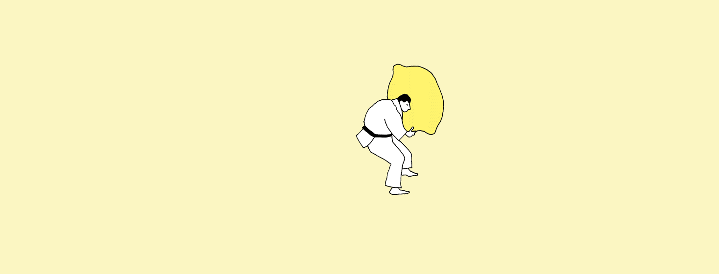 a man practicing Jiu Jitsu by wresting a lemon to the ground, upon which it bursts into liquid lemonade