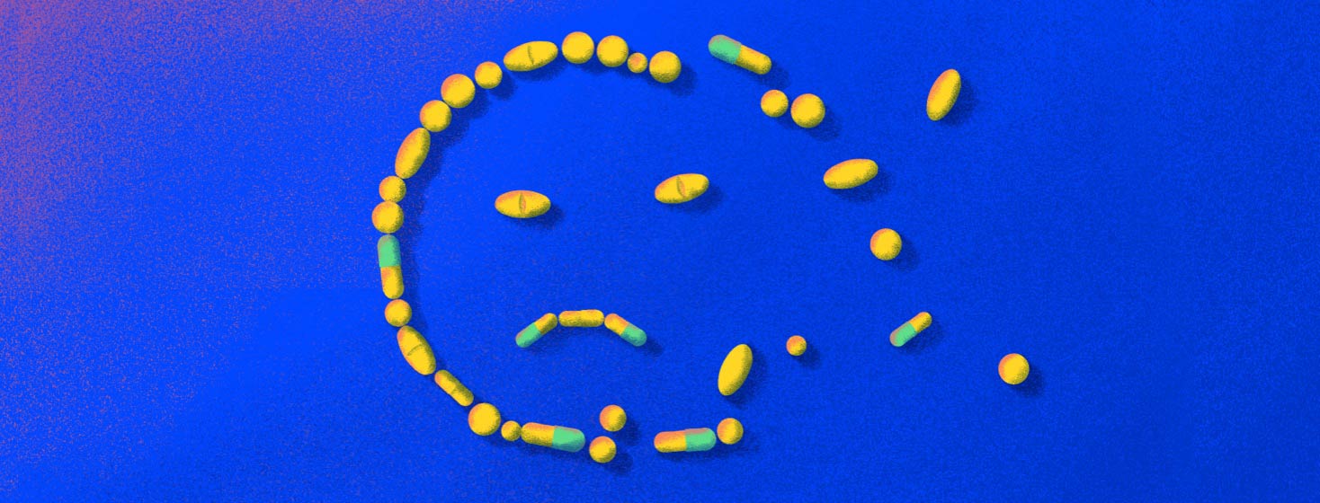 a frown face made of medications
