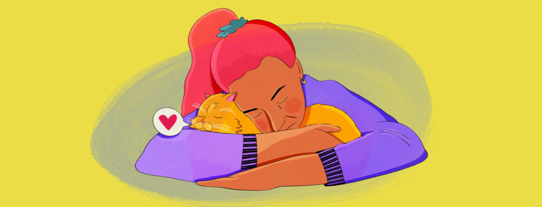a woman snuggles with her pet