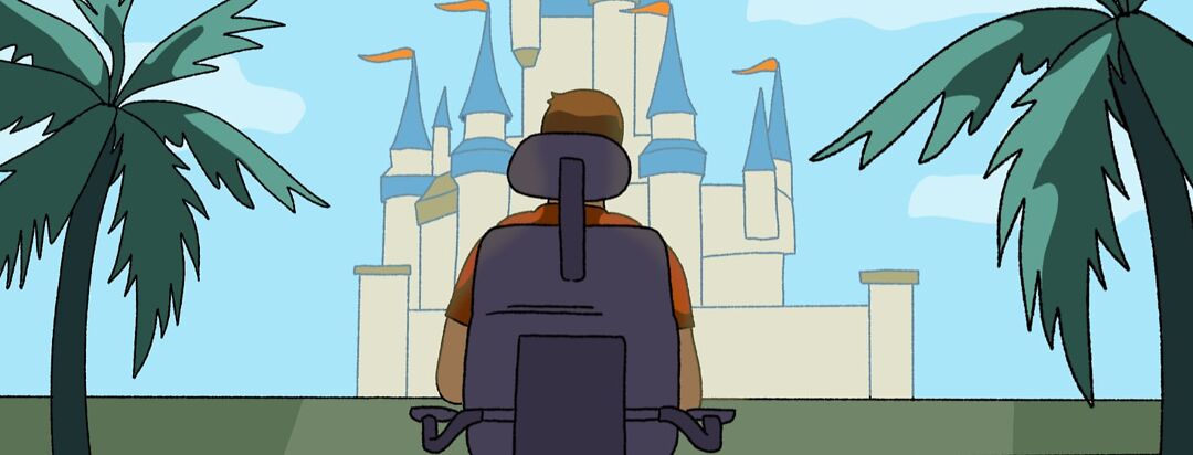 The view of the back of a person in a wheelchair sits in front of a magic castle on vacation.